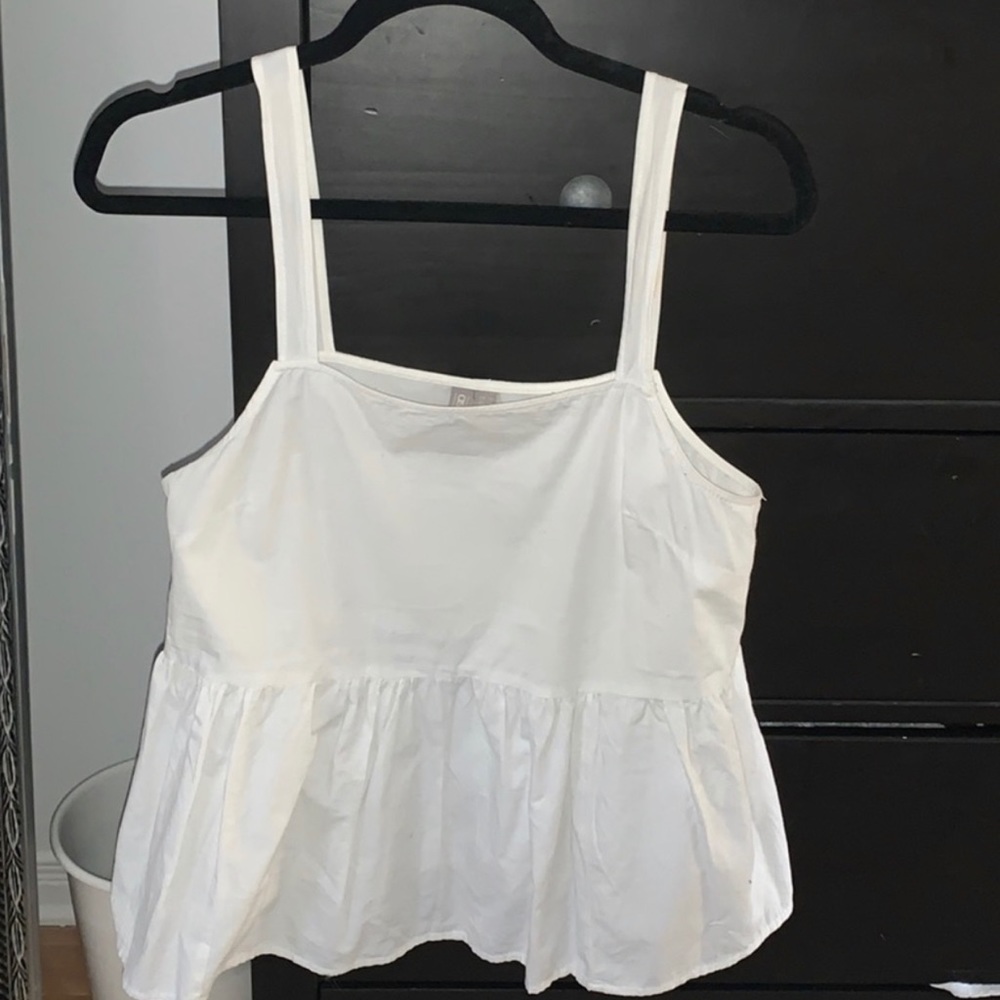 Peplum tank in white